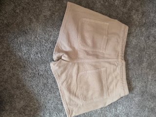 Pantalones cortos efecto piel verde