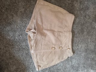 Pantalones cortos efecto piel verde
