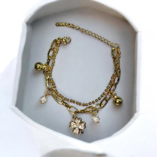 Bracciale tennis acciaio dorato con ciondoli
