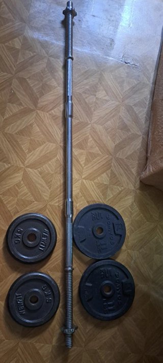 Barra de pesas con discos