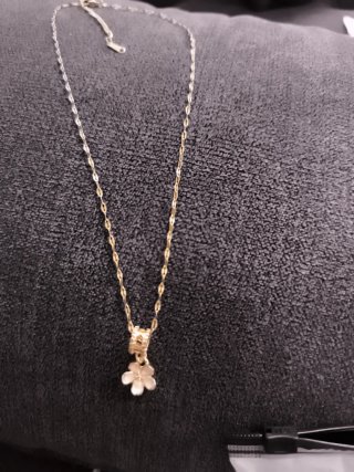Cadena de acero con colgante flor