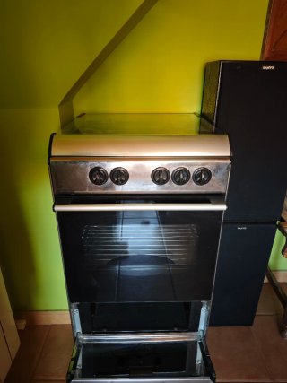 Cocina de gas 4 fuegos horno inox