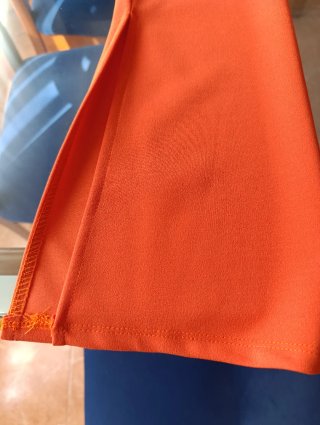 Blusa naranja con volantes y cintura elástica
