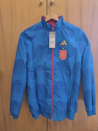 Cortavientos reversible de españa en azul/rojo