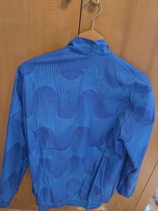 Cortavientos reversible de españa en azul/rojo
