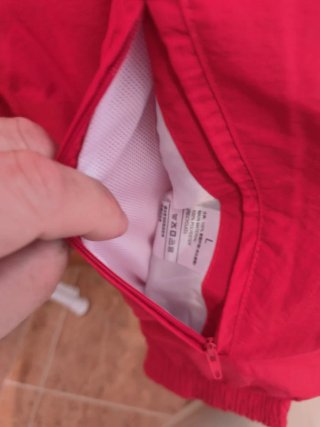 Cortavientos reversible de españa en azul/rojo