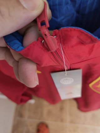 Cortavientos reversible de españa en azul/rojo