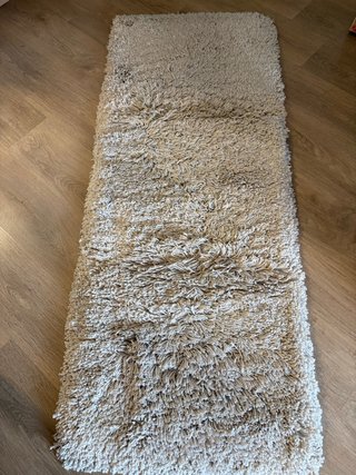 Alfombra de lana beige
