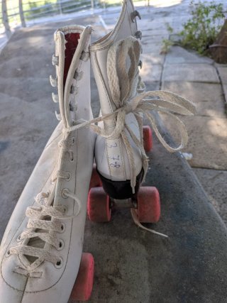 Patines de 4 ruedas blancos