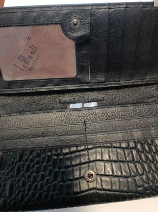 Cartera TUMI Negra de piel