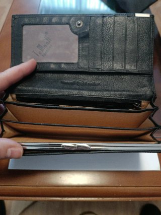 Cartera TUMI Negra de piel