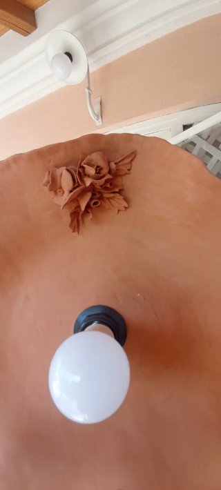 Lampadario in terracotta e metallo