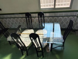 Mesa de cristal con 6 sillas