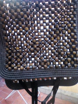 Funda asiento coche bolitas madera
