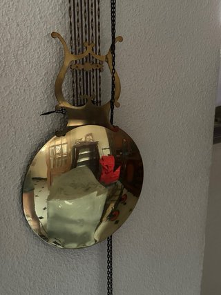 Reloj ODO de pared antiguo dorado