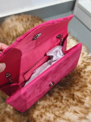 Bolso de mano rosa