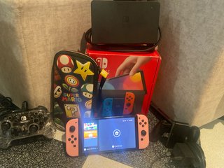 Nintendo Switch OLED Rosa y Multicolor