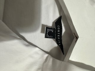 Camisa elegante blanca con bordado