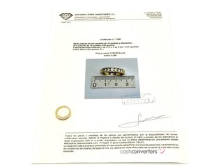 alianza oro 18k con piedra con diamante