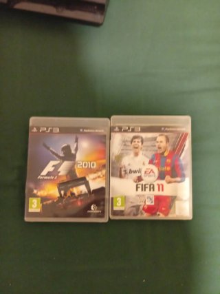Consola PlayStation 3 Negra y varios juegos