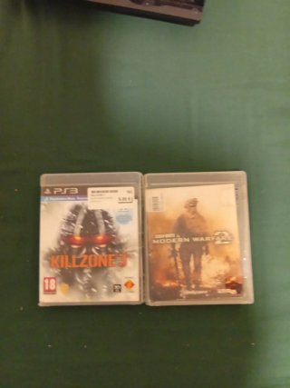Consola PlayStation 3 Negra y varios juegos