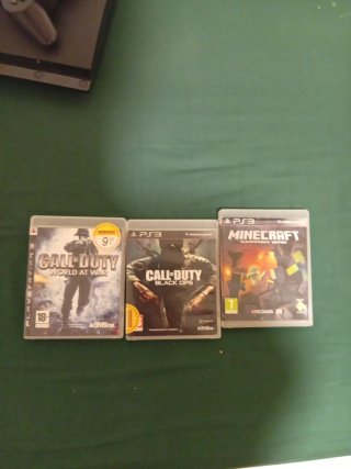 Consola PlayStation 3 Negra y varios juegos
