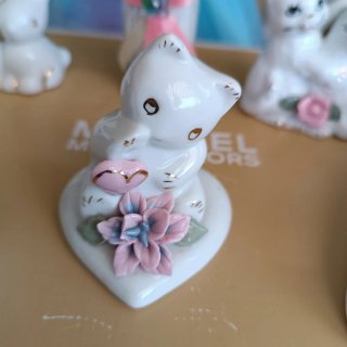 Lote 6 figuras porcelana: conejos, gatos, osos