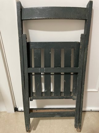 Antigua silla plegable de madera