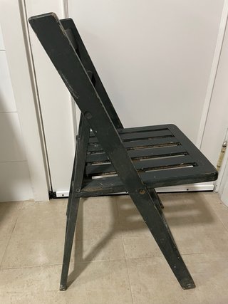 Antigua silla plegable de madera
