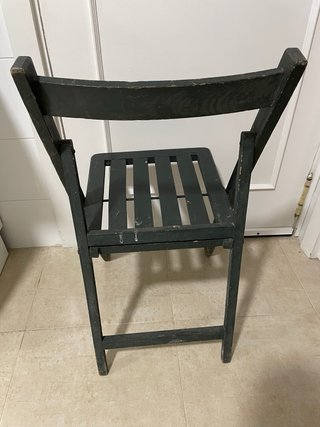 Antigua silla plegable de madera