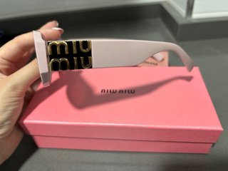 Gafas de sol Miu Miu rosas y marrones