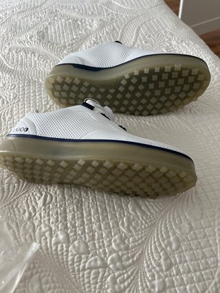 Zapatos de golf blancos y azules