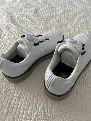 Zapatos de golf blancos y azules