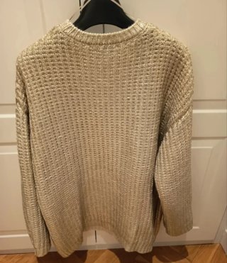 Jersey de lana beige dorado oversize