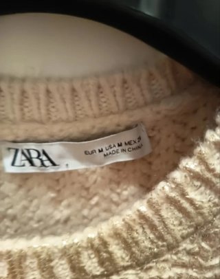Jersey de lana beige dorado oversize