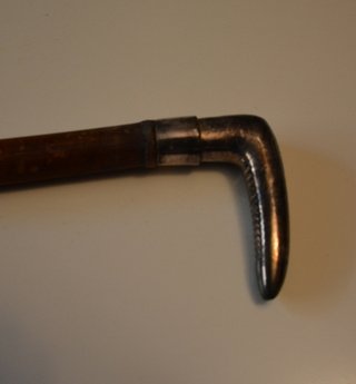 Antiguo bastón de plata