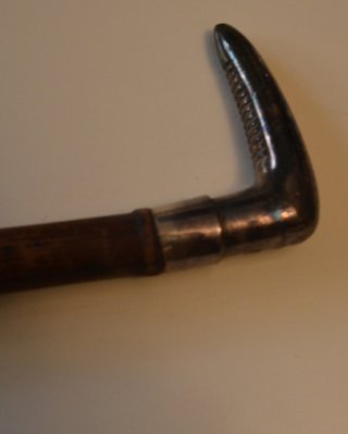 Antiguo bastón de plata