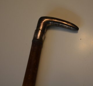 Antiguo bastón de plata