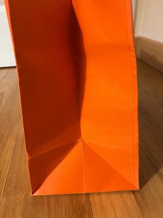 Bolsa de papel naranja Hermès