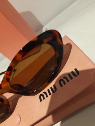 Gafas de sol Miu Miu Tortoise y Oro