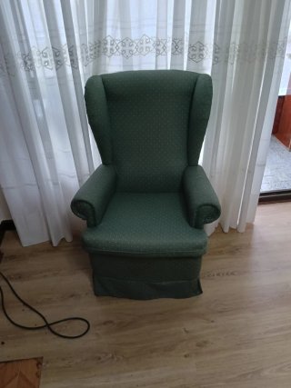Sillón orejero verde