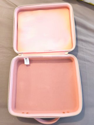 Maletín rosa con lazos