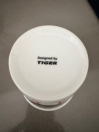 Taza cerámica con dibujo de pájaro