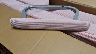 Sillón rosa convertible en cama individual