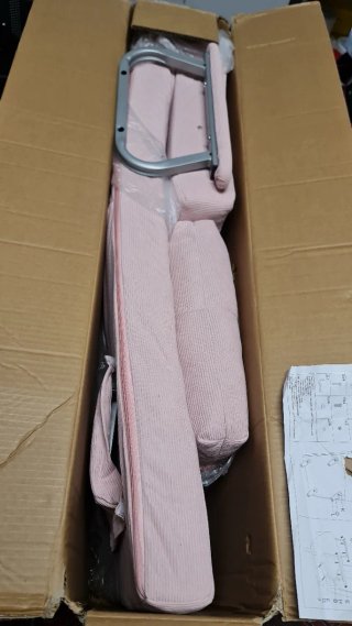 Sillón rosa convertible en cama individual