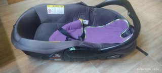 Silla de coche infantil marrón y naranja