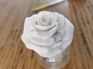 Profumatore per ambienti con fiore bianco