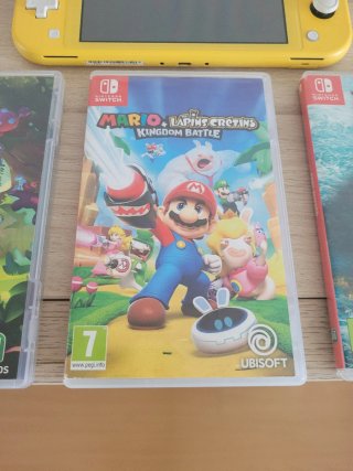 Nintendo Switch Lite + Accesorios y muchos juegos