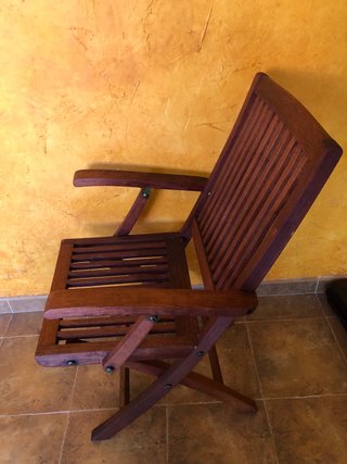 Silla de teca con reposabrazos