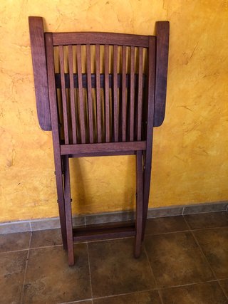Silla de teca con reposabrazos